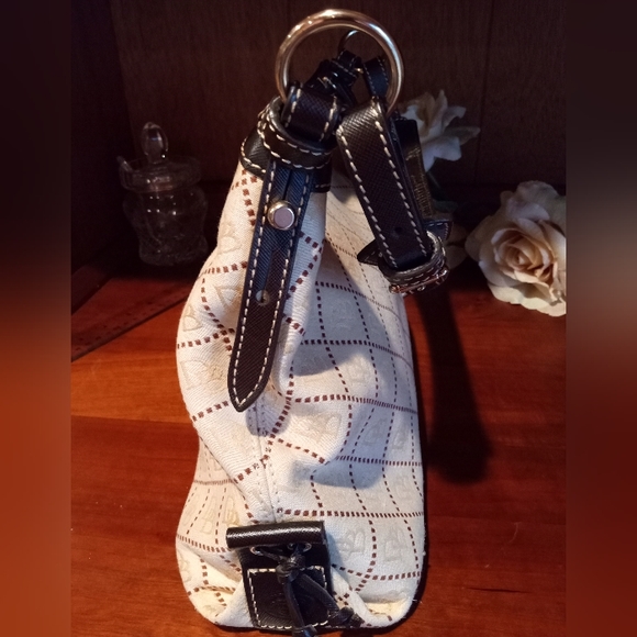 Dooney and Bourke East West Slouch canvas signature fabric. Cream and brown. - Picture 9 of 16